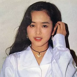 葉蘊儀 飾演 Belle Kao