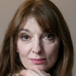 Olimpia Carlisi 飾演 Madam