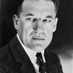 Walter Long 飾演 Henchman Slade