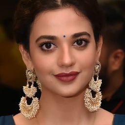 施露蒂·夏瑪 飾演 Nazia Zaidei