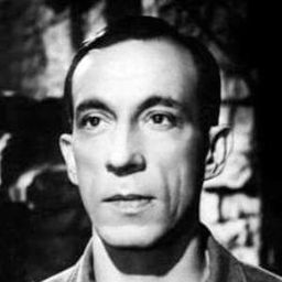 Raymond Bussières 飾演 Robert