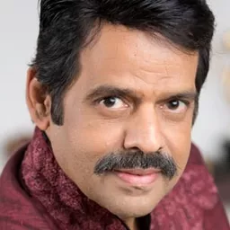 Balachandra Menon 飾演 