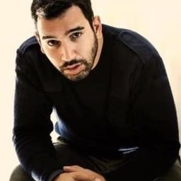 Guido Loconsolo 飾演 Achilla