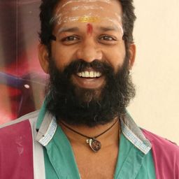 Baba Baskar 飾演 Theerthamalai