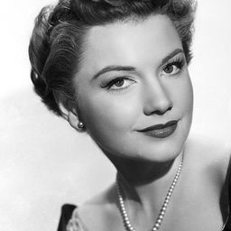 Anne Baxter 飾演 Kit Dodge Jr.