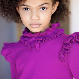 麥迪遜·絲凱·韋里頓 飾演 Charlotte Garrick