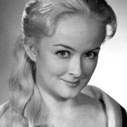 Susan Luckey 飾演 Louise Bigelow