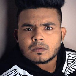 Noble K. James 飾演 'Mutta Puffs' Vasanth