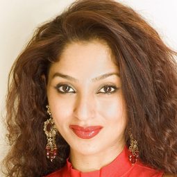 Suman Ranganathan 飾演 Nita