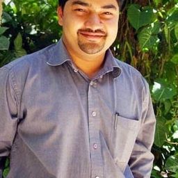 Manjunath 飾演 Young Vijay