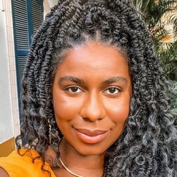 英迪拉·娜辛門托 飾演 Emilia Nascimento