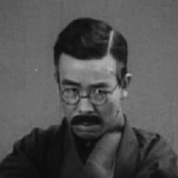 河村黎吉 飾演 Doi