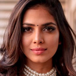 Malavika Mohanan 飾演 Poongodi