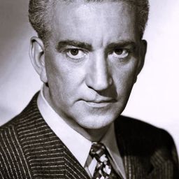 John Litel 飾演 Jean La Cour