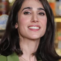 希薇亞·迪阿米可 飾演 Patrizia