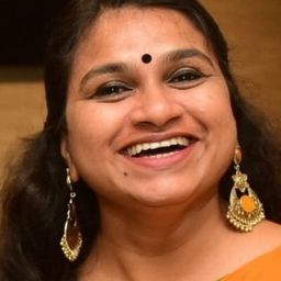 Geethi Sangeetha 飾演 Satheesh's Wife