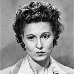 Claude Nollier 飾演 Clotilde Duveyrier, prosecutor's wife