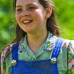 莉兒·伍茲 飾演 Megsie Green