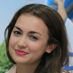 麗安緹·卡特萊特 飾演 Aisha Greimas