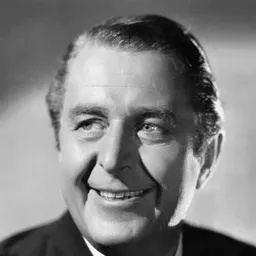 Reginald Owen 飾演 Henry Carmel