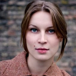 Gintare Parulyte 飾演 Bernard's Secretary