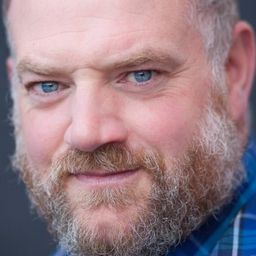 Mark Neilson 飾演 Gil O'Leary