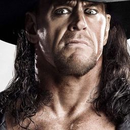 Mark William Calaway 飾演 The Undertaker