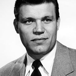 Neville Brand 飾演 Leo
